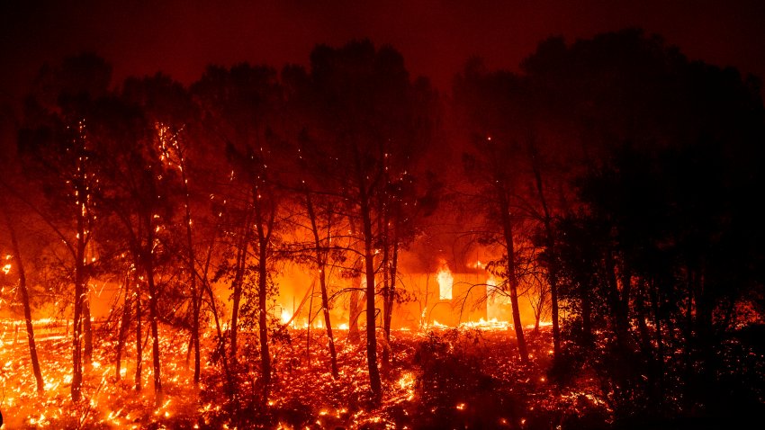 A home burns in the valley area of Vacaville, northern California during the LNU Lightning Complex fire on August 19, 2020. – As of the late hours of August 18, the Hennessey fire has merged with at least 7 fires and is now called the LNU Lightning Complex fires. Dozens of fires are burning out of control throughout Northern California as fire resources are spread thin. (Photo by JOSH EDELSON / AFP) (Photo by JOSH EDELSON/AFP via Getty Images)