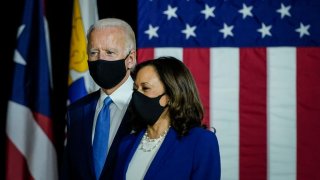 WILMINGTON, DE - AUGUST 12: Democratic presidential candidate former Vice President Joe Biden and his running mate Sen. Kamala Harris (D-CA) arrive to deliver remarks at the Alexis Dupont High School on August 12, 2020 in Wilmington, Delaware. Harris is the first Black woman and first person of Indian descent to be a presumptive nominee on a presidential ticket by a major party in U.S. history.