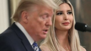 In this April 28, 2020, file photo, White House advisor Ivanka Trump listens to her father U.S. President Donald Trump deliver remarks on supporting small businesses through the Paycheck Protection Program in the East Room of the White House in Washington, D.C.