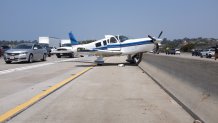 An airplane made an emergency landing on Interstate 5 near Del Mar on Tuesday, Aug. 24, 2021.