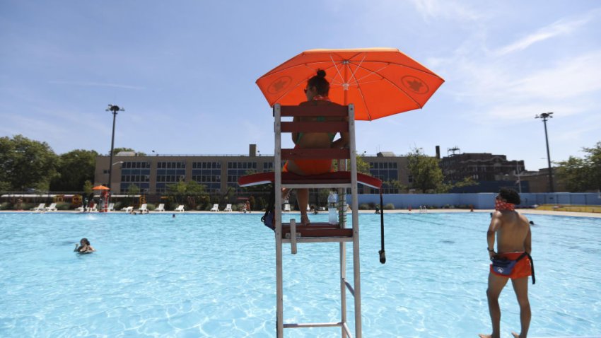 NEW YORK, July 27, 2020  — Lifeguards are seen on duty by a swimming pool in New York, the United States, on July 27, 2020. A heat wave hit New York City on Monday as the highest temperature reached over 36 degrees Celsius.  (Photo by Wang Ying/Xinhua via Getty) (Xinhua/Wang Ying via Getty Images)