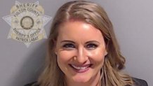 ATLANTA, GEORGIA - AUGUST 23: In this handout provided by the Fulton County Sheriff's Office, former Trump lawyer Jenna Ellis poses for her booking photo on August 23, 2023 in Atlanta, Georgia. Former President Donald Trump and 18 others facing felony charges in the indictment related to tampering with the 2020 election in Georgia have been ordered to turn themselves in by August 25. (Photo by Fulton County Sheriff's Office via Getty Images)