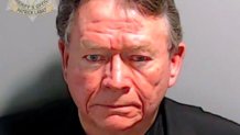ATLANTA, GEORGIA - AUGUST 25: In this handout provided by the Fulton County Sheriff's Office, Lutheran pastor Stephen Cliffgard Lee poses for his booking photo at the Fulton County Jail on August 25, 2023 in Atlanta, Georgia. Former President Donald Trump and 18 others facing felony charges in the indictment related to tampering with the 2020 election in Georgia have been ordered to turn themselves in by August 25. (Photo by Fulton County Sheriff's Office via Getty Images)