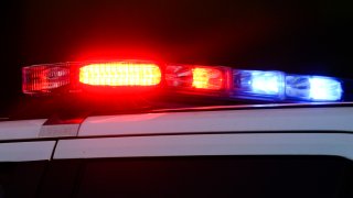 Shown are the lights of a police vehicle in Philadelphia, Thursday, June 24, 2021.