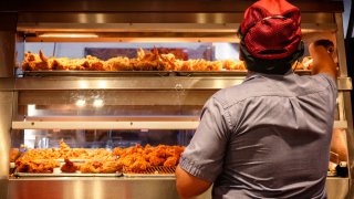 Minimum Wage Employee Works in a Fast Food Kitchen