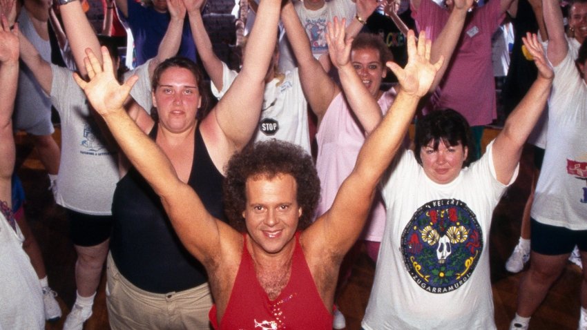 Richard Simmons with a group of people