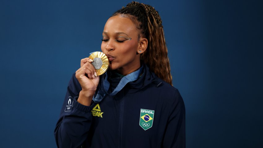 PARIS, FRANCE – AUGUST 05: Gold medalist Rebeca Andrade of Team Brazil poses after the Artistic Gymnastics Women’s Floor Exercise Medal Ceremony on day ten of the Olympic Games Paris 2024 at Bercy Arena on August 05, 2024 in Paris, France. (Photo by Jamie Squire/Getty Images)