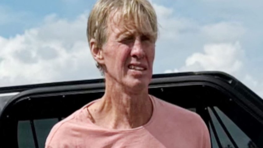 Ryan W. Routh, suspected of attempting to assassinate Donald Trump at his West Palm Beach golf course, stands handcuffed after his arrest during a traffic stop near Palm City, Florida, Sept. 15, 2024.