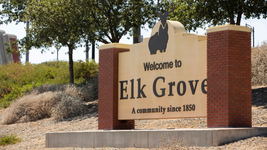 Elk Grove, California, USA – July 16, 2021: Afternoon sunlight shines on the freeway welcome sign of Elk Grove.