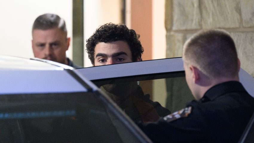 HOLLIDAYSBURG, PENNSYLVANIA – DECEMBER 10: Suspected shooter Luigi Mangione is led from the Blair County Courthouse after an extradition hearing December 10, 2024 in Hollidaysburg, Pennsylvania. Mangione has been arraigned on weapons and false identification charges related to the fatal shooting of United Healthcare CEO Brian Thompson in New York City. Mangione is incarcerated in the State Correctional Institution in Huntingdon, Pennsylvania awaiting extradition to New York. (Photo by Jeff Swensen/Getty Images)