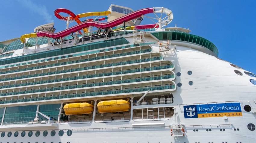 Ensenada, BC, Mexico – June 4, 2023: Royal Caribbean’s Navigator of the Seas cruise ship with view of the water slide tube and balconies.