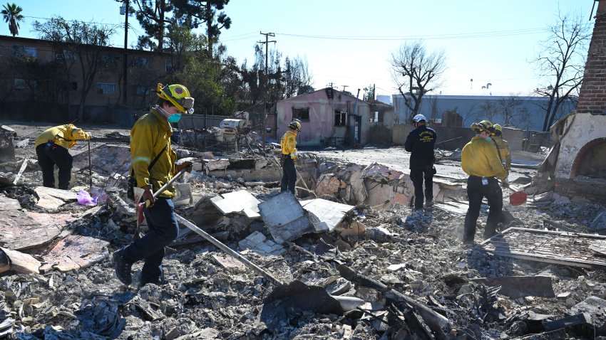 LOS ANGELES, CA – JANUARY 13: Cal Fire search and rescue team look through for possible human remains in ashes of burned houses after massive wildfire in Altadena of Los Angeles County, California, United States on January 13, 2025. (Photo by Tayfun Coskun/Anadolu via Getty Images)