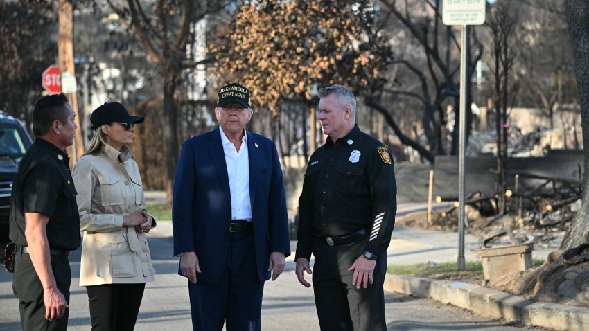 US President Donald Trump and First Lady Melania Trump tour a fire-affected area in the Pacific Palisades neighborhood of Los Angeles, California, on January 24, 2025. (Photo by Mandel NGAN / AFP) (Photo by MANDEL NGAN/AFP via Getty Images)