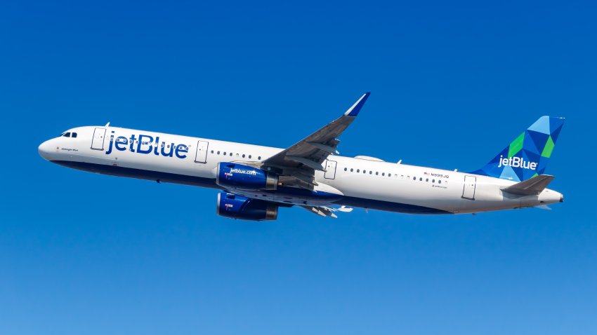 New York City, New York – March 1, 2020: JetBlue Airbus A321 airplane at New York JFK Airport in the United States. Airbus is a European aircraft manufacturer based in Toulouse, France.