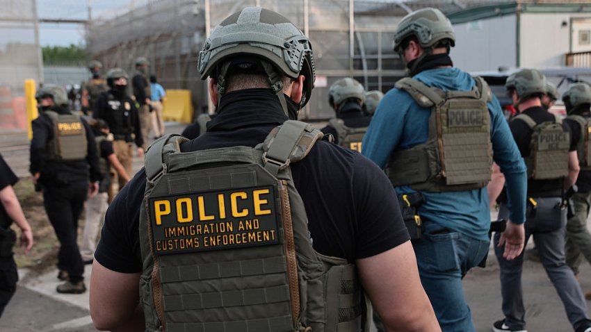 NEWARK, NEW JERSEY – MAY 27: Immigration and Customs Enforcement (ICE) agents block protesters as cars exit Delaney Hall, which is being used as an Immigration and Customs Enforcement detention center, on May 27, 2026 in Newark, New Jersey. The protests, which have become tense over the holiday weekend, come amid reports of an ongoing hunger strike by detainees.  (Photo by Michael M. Santiago/Getty Images)